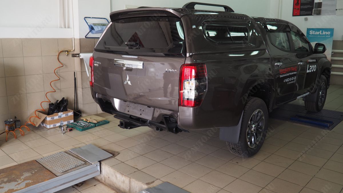 ABC.MCCL200.RB.11.01B Бампер АВС-Дизайн задний с квадратом под ДО Mitsubishi L200 2018- (чёрный)