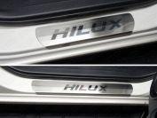 Накладки на пороги (лист шлифованный надпись Hilux) для автомобиля Toyota Hilux 2015-