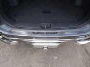 Накладка на задний бампер (лист шлифованный надпись Pajero Sport) для автомобиля Mitsubishi Pajero Sport 2016-