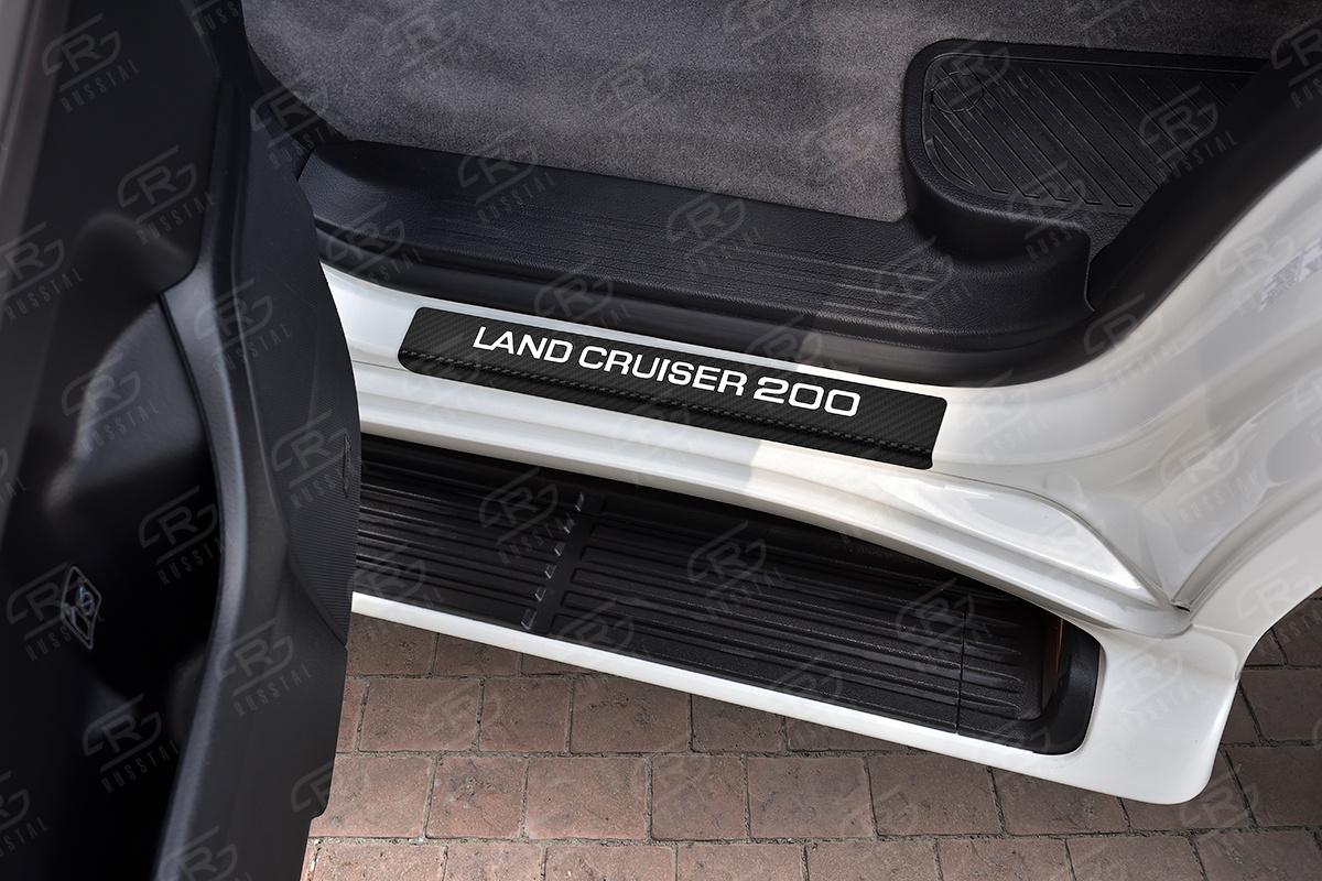 Накладки на пороги RUSSTAL (нерж., карбон, надпись) TOYLC07-06 для автомобиля Toyota Land Cruiser 200 2007-2012, Slitkoff