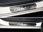 Накладки на пороги (лист зеркальный надпись Hilux) для автомобиля Toyota Hilux 2015-